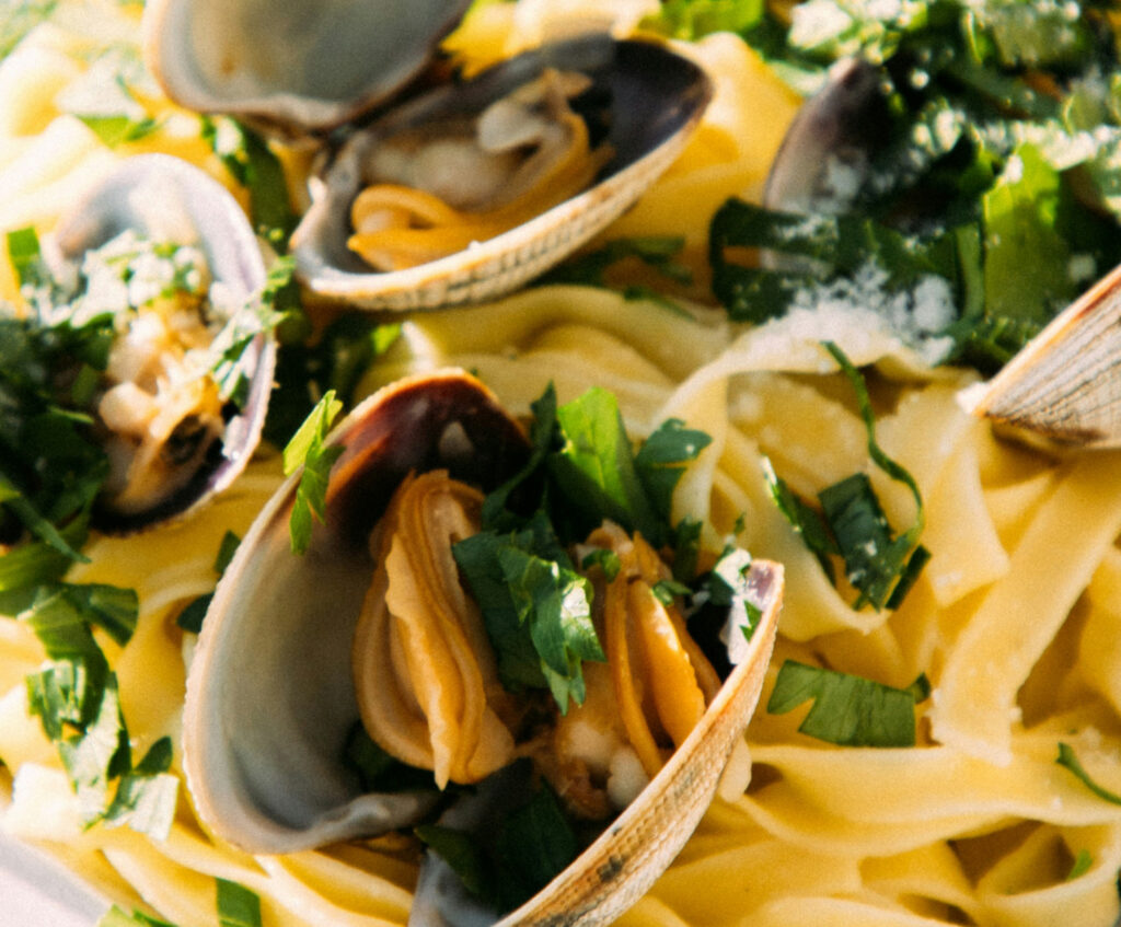 Close up of seafood pasta and herbs